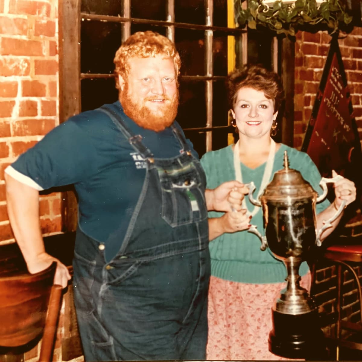 Jim Quessenberry and his wife celebrating a victory at Memphis in May.